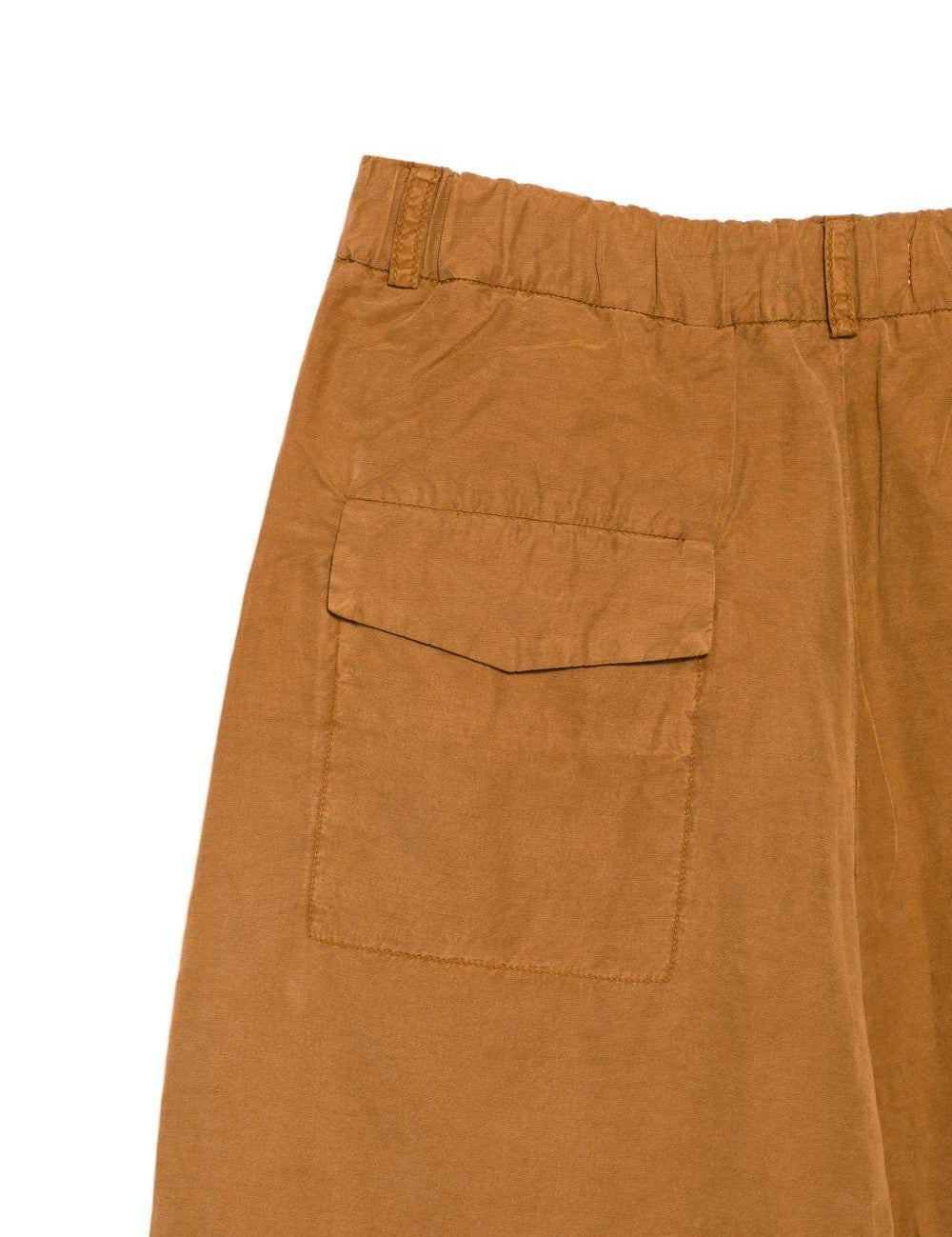 Pantaloni a gamba larga con pieghe in arancione Ymc - uomo 