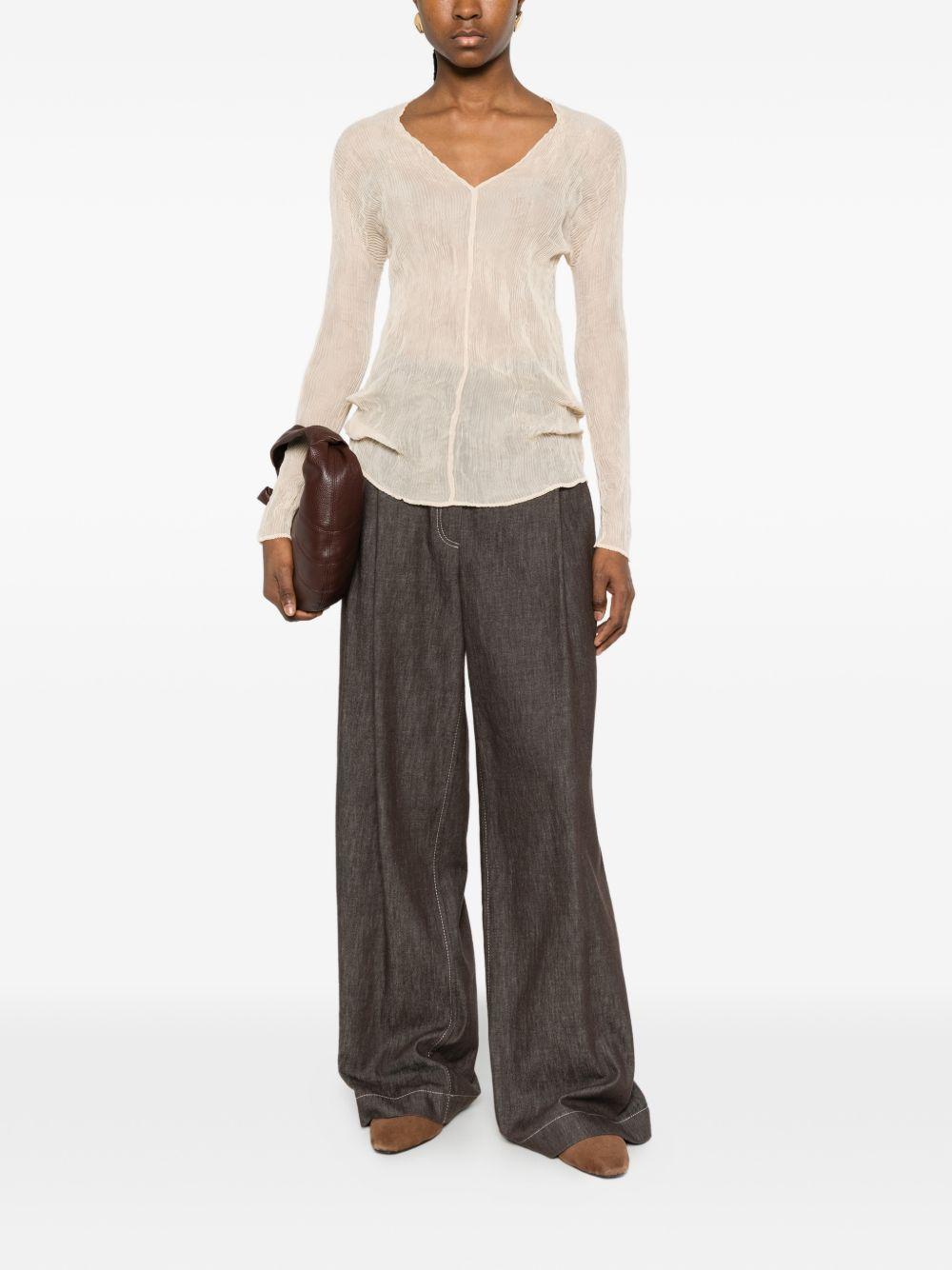 Top a maniche lunghe con design plissettato in avorio Issey miyake  - donna 