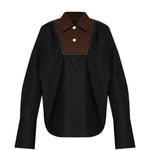 Camicia con inserti a contrasto in nero 