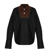 Camicia con inserti a contrasto in nero 