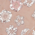 Abito midi con stampa floreale e decorazioni di paillettes in rosa 