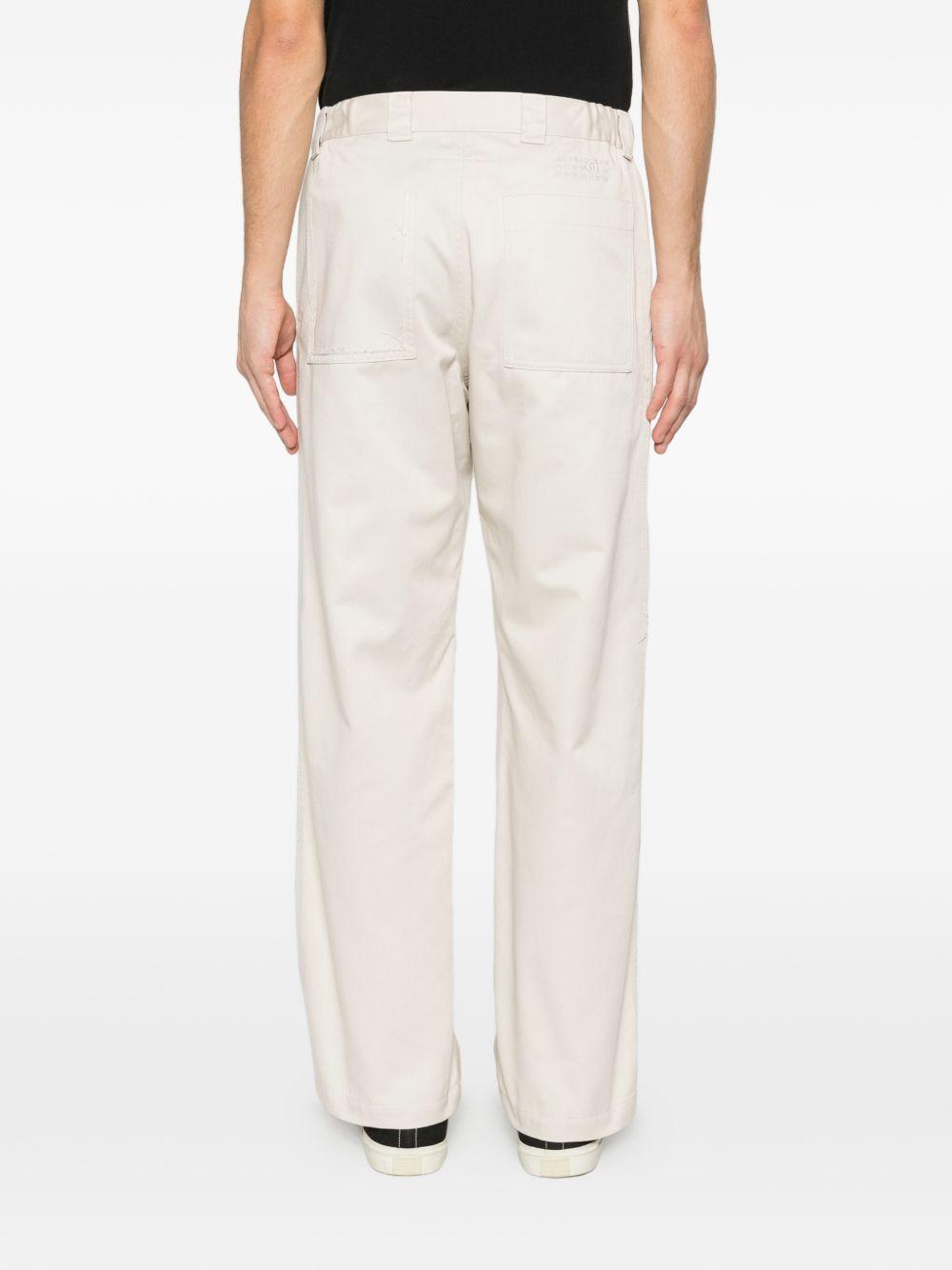 Pantaloni con cuciture a contrasto in avorio MM6 Maison Margiela - uomo 