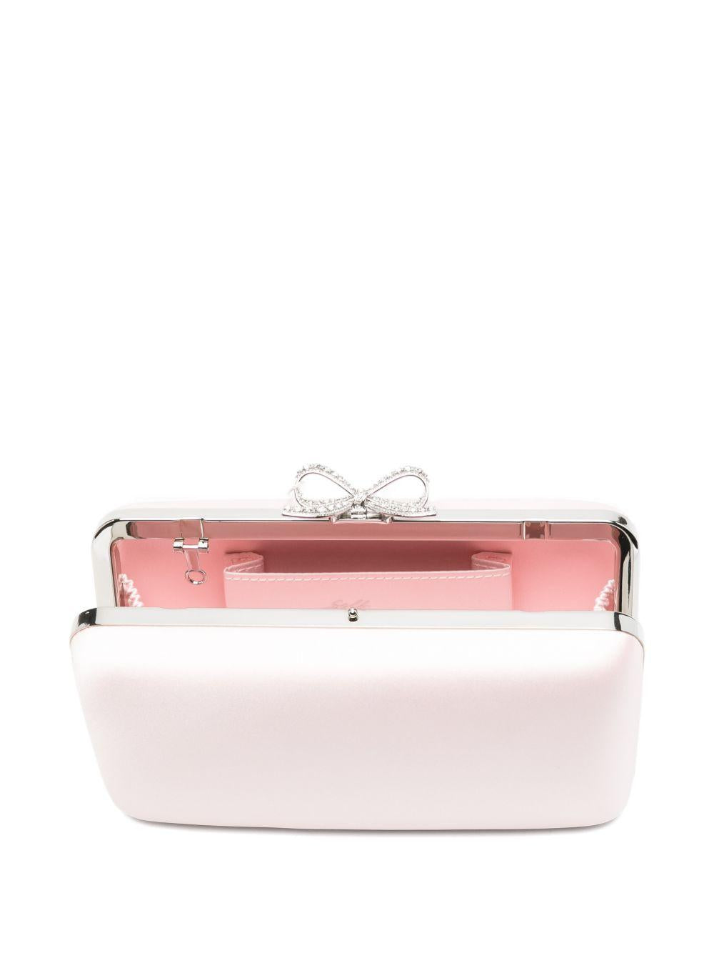Clutch in raso con fiocco in rosa 