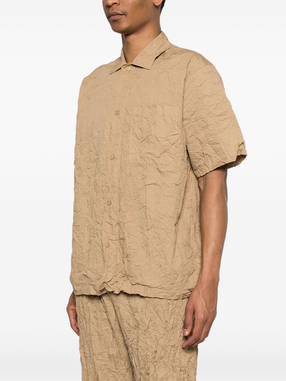 T-shirt con taschino in beige Gongdid design - uomo 