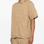 T-shirt con taschino in beige Gongdid design - uomo 