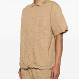 T-shirt con taschino in beige Gongdid design - uomo 
