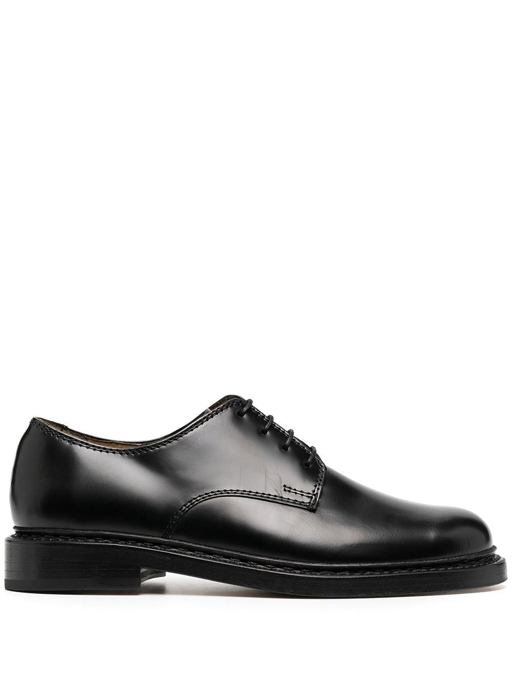 Derby uniform parade in nero Our legacy - uomo 