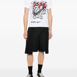 T-shirt con stampa in bianco e nero  Comme Des Garçons Black  x Nike - unisex 