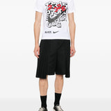 T-shirt con stampa in bianco e nero  Comme Des Garçons Black  x Nike - unisex 