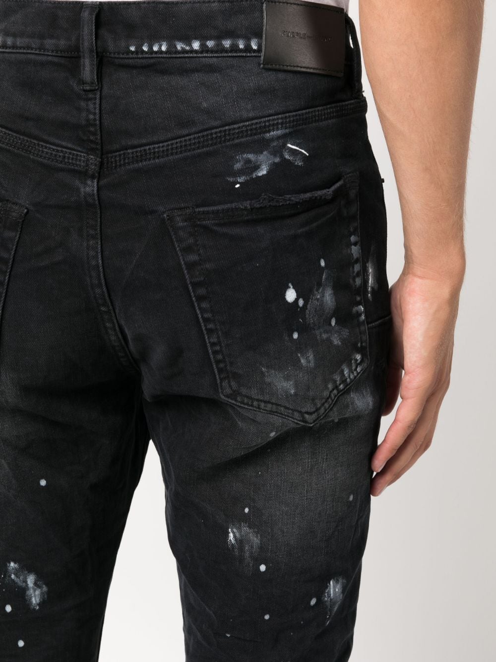 Black ripped paint-splatter jeans - men - PURPLE - divincenzoboutique.com