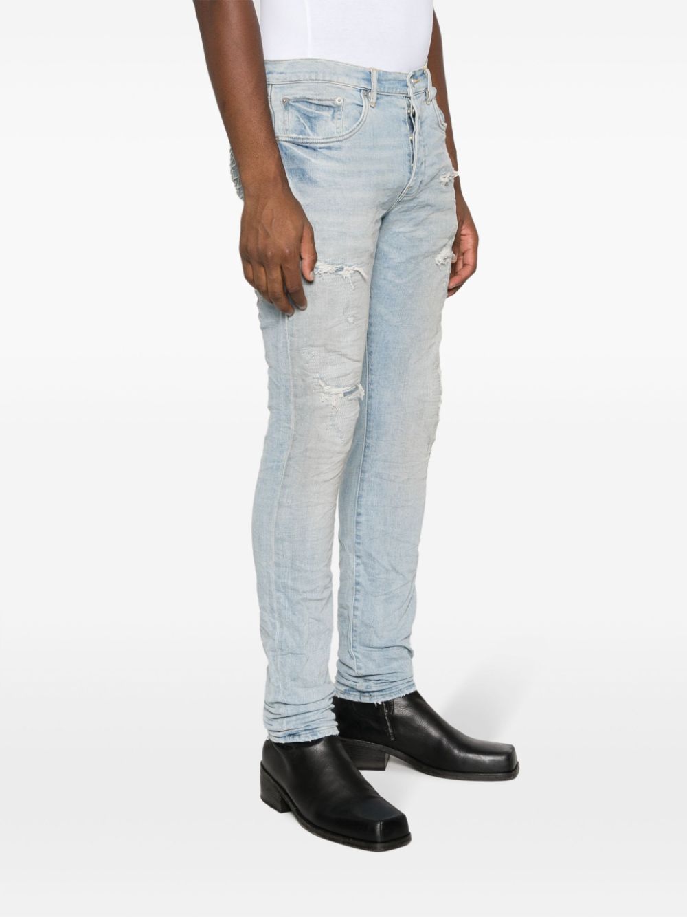 Jeans slim con effetto vissuto in blu - uomo PURPLE | PBP001LQDP