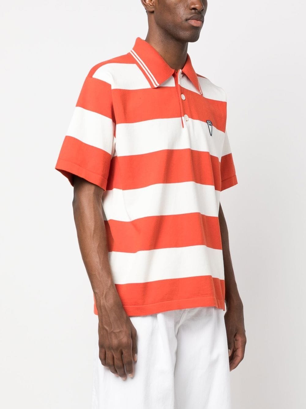 Polo a righe con stampa in bianco e arancione - uomo KENZO | FD55PU3713CN21