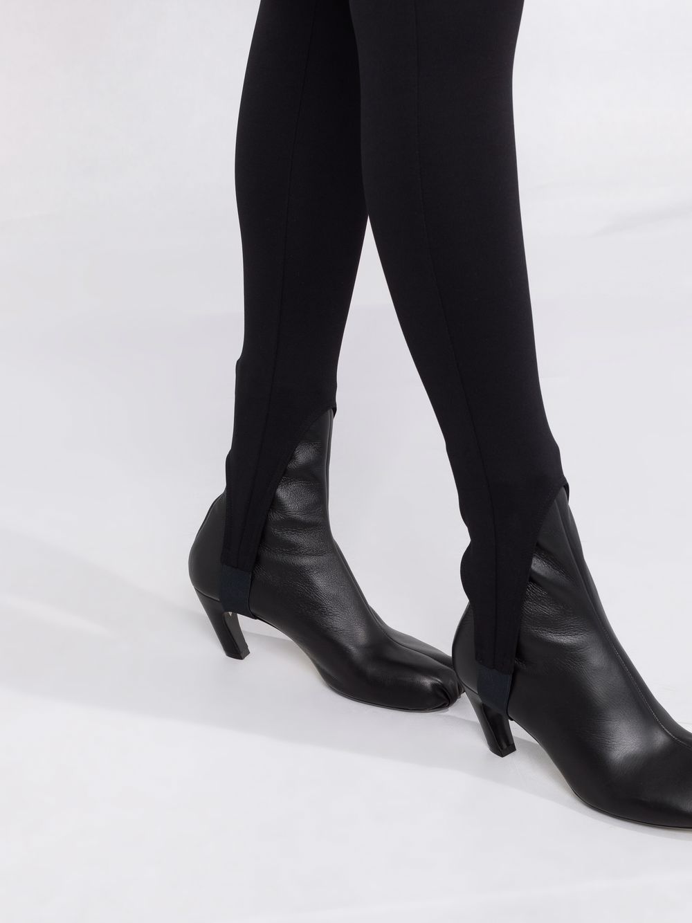 Black high-waist stirrup leggings - women