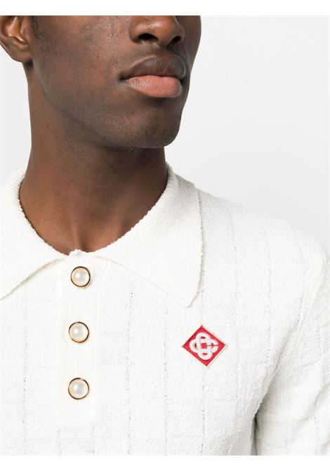 White logo-embroidered boucl? polo shirt - men CASABLANCA | MF23KW53701WHT