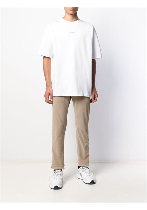White slogan-print short-sleeve T-shirt - men DRÔLE DE MONSIEUR | PERMP01WT