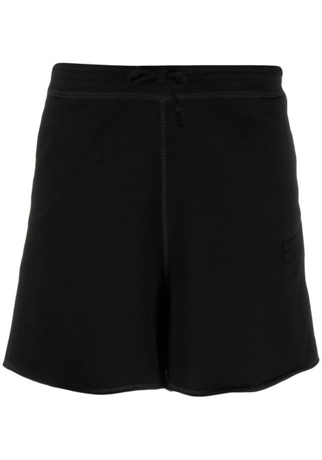 Shorts con coulisse in nero - donna GANNI | Shorts | T3565099