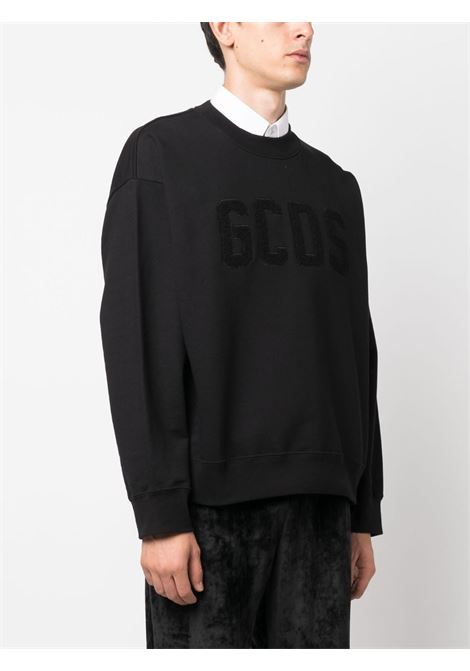 Black flocked-logo sweatshirt - men GCDS | FW23M11011502