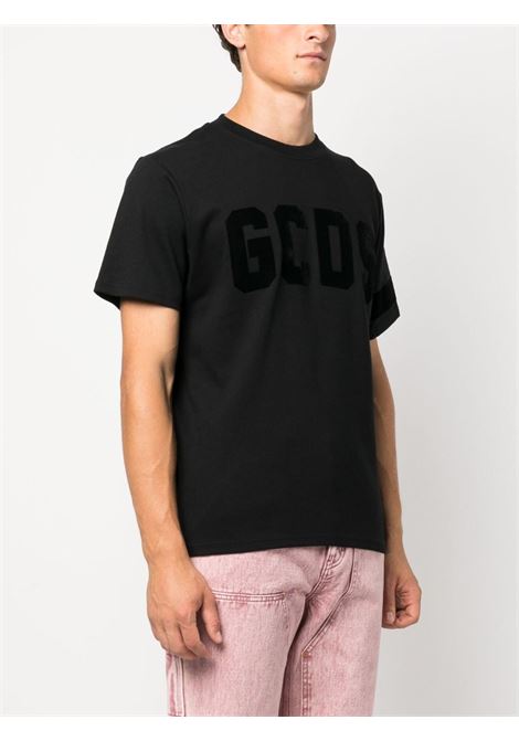 Black logo-print T-shirt - men GCDS | FW23M13012902