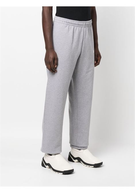 Grey logo-print track trousers - men JACQUEMUS | 226JS0812210950