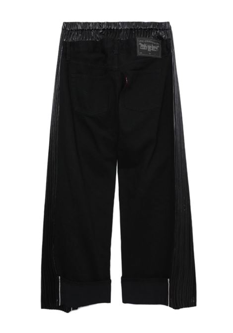 Pantaloni crop con applicazione logo in nero - donna JUNYA WATANABE | JLP1021