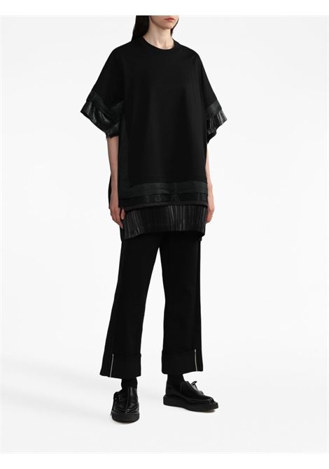 Black logo-patch panelled-design cropped trousers - women JUNYA WATANABE | JLP1021