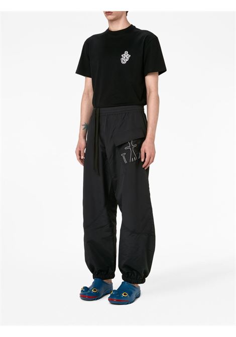 Pantaloni sportivi con logo in nero - unisex JW ANDERSON | TR0282PG1345999