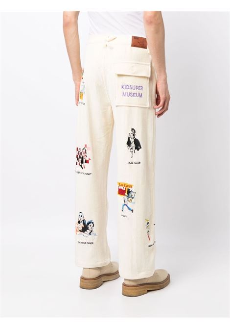 Pantaloni a coste Museum con ricamo in bianco - uomo KIDSUPER | PT14CRM