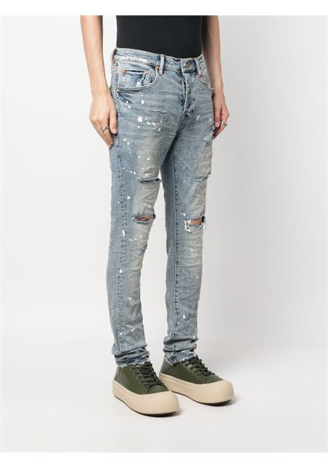 Jeans con strappi a vita media in blu - uomo PURPLE | PBP001LIP