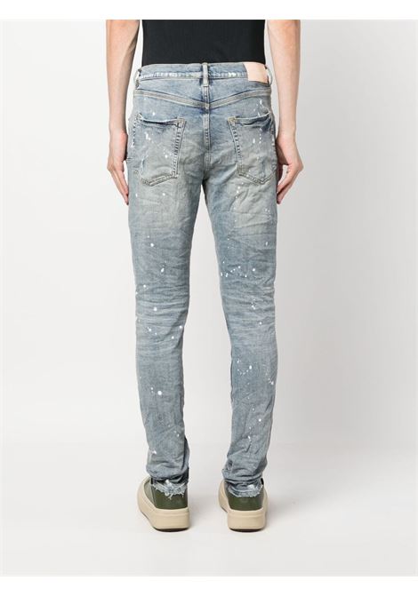 Jeans con strappi a vita media in blu - uomo PURPLE | PBP001LIP