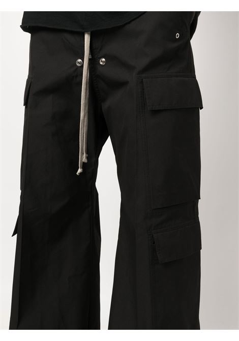 Pantaloni con zip laterale in nero - uomo RICK OWENS | RU02C7339TE09
