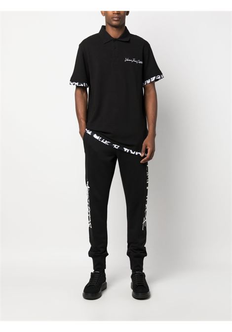 Black logo-print polo shirt - men VERSACE JEANS COUTURE | 75GAGT10CJ01T899