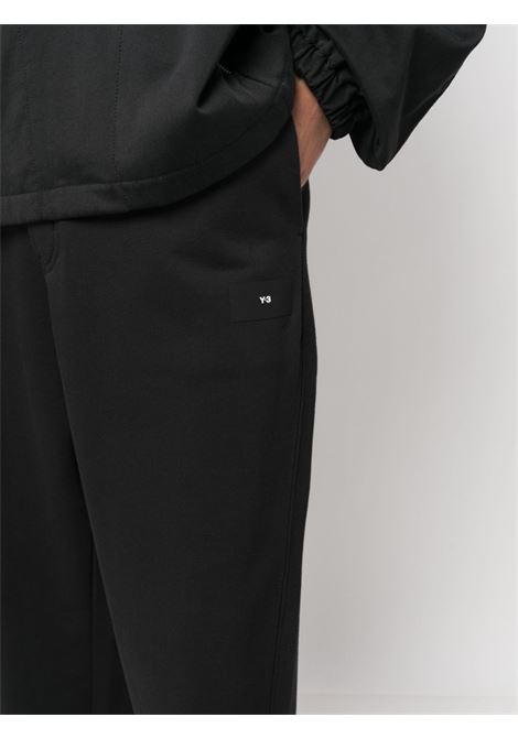 Pantaloni sportivi con applicazione logo in nero - uomo Y-3 | IL1784BLK