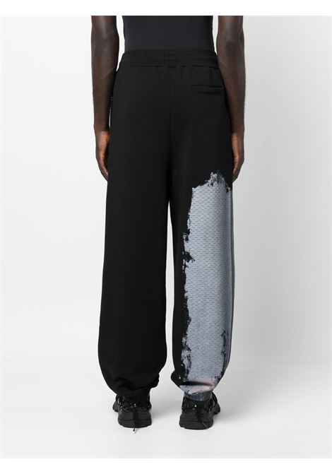 Black abstract-print track trousers - men A-COLD-WALL* | ACWMB189BLK