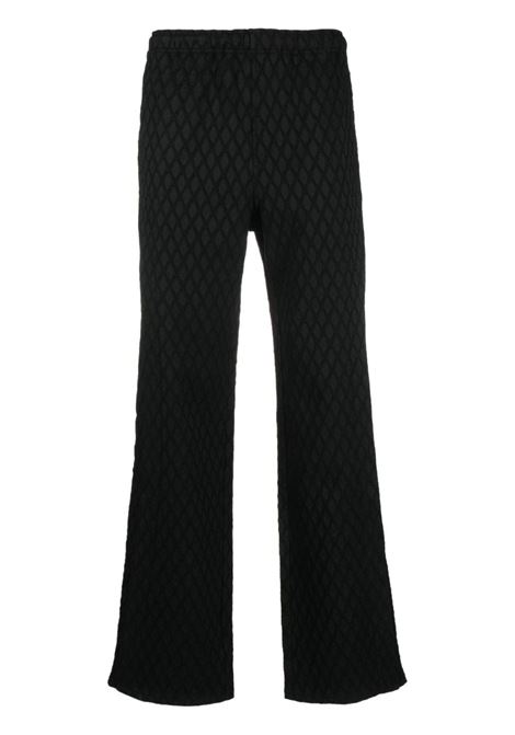 Pantaloni con effetto jacquard in nero - uomo ANDERSSON BELL | APA590MBLK