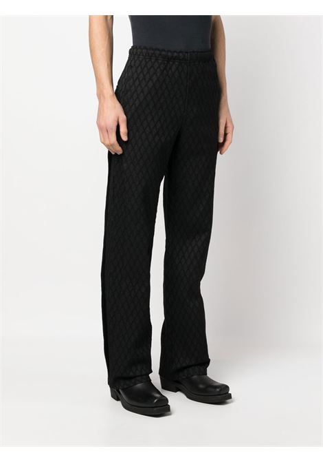 Black jacquard layered panel trousers - men ANDERSSON BELL | APA590MBLK