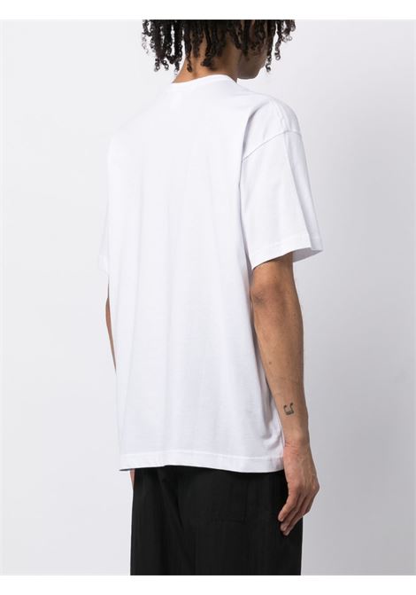 T-shirt con stampa grafica in bianco - uomo COMME DES GARCONS SHIRT | FKT0140512