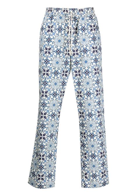 Blue all-over graphic-print trousers - men DRÔLE DE MONSIEUR | BBP132CO049BE