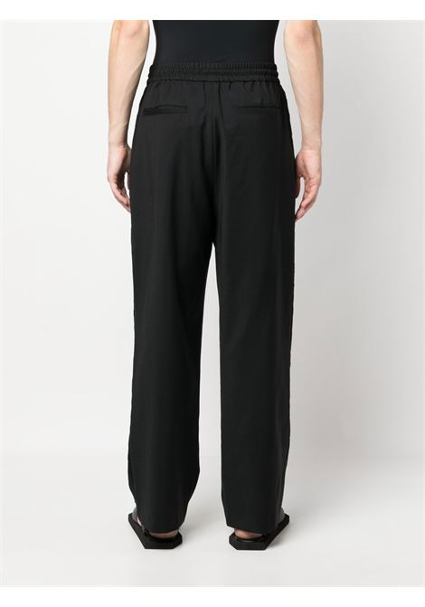 Black elasticated-waist wide-leg trousers - men FENG CHEN WANG | FMS15TR13BLK