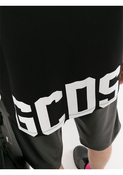 Black logo-print T-shirt - men GCDS | SS23M13020402