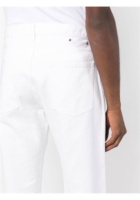 Jeans dritti con effetto vissuto in bianco - uomo GOLDEN GOOSE | GMP01186P00097810190