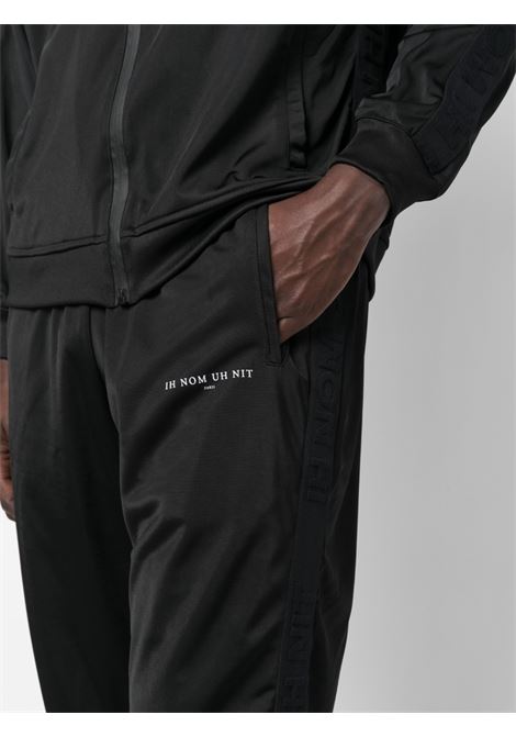 Black logo-embellished side panels track trousers - men IH NOM UH NIT | NUS23310009