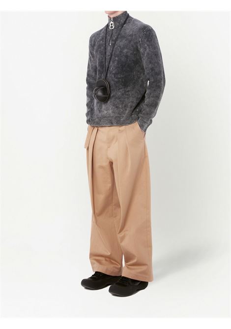 Pantaloni a gamba ampia con pieghe in beige - uomo JW ANDERSON | TR0272PG0947132