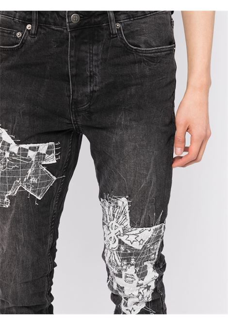 Black graphic-print skinny jeans - men KSUBI | MPS23DJ001BLK