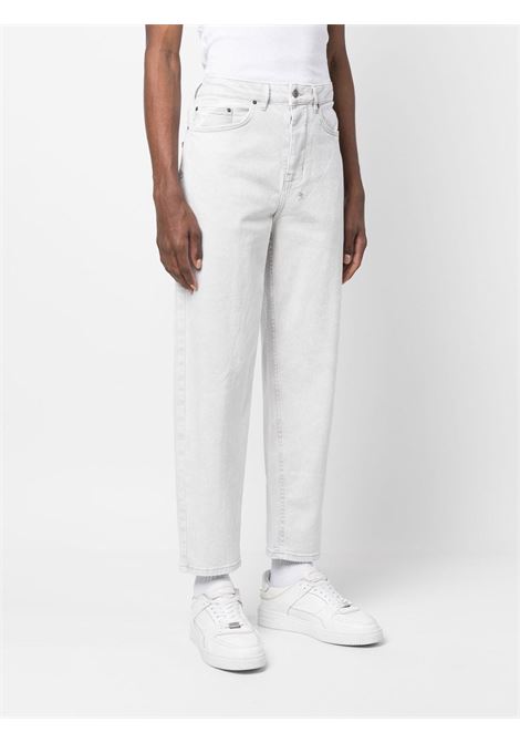 White logo-tag mid-rise jeans - men KSUBI | MPS23DJ034WHT