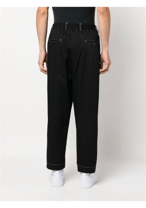 Black contrast-stitching trousers - men MARNI | PUMU0017A2UTC08400N99