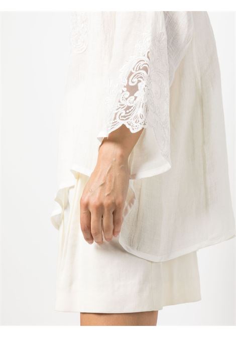 White lace-trimmed bell sleeve blouse - women MAURIZIO | W0823027524