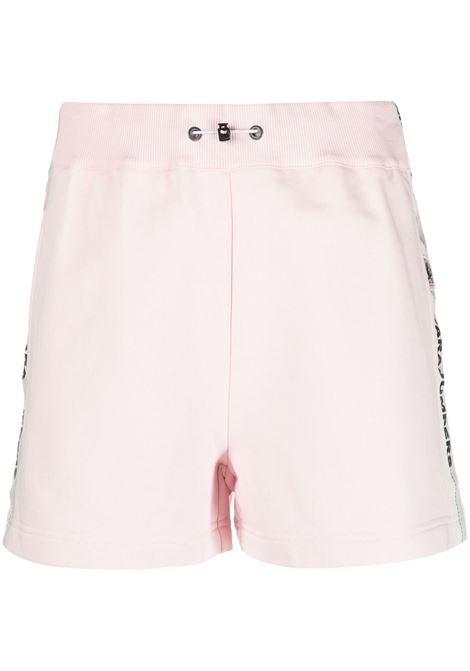Shorts con logo in rosa - donna