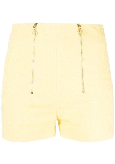 Shorts sartoriali con doppia zip in giallo - donna