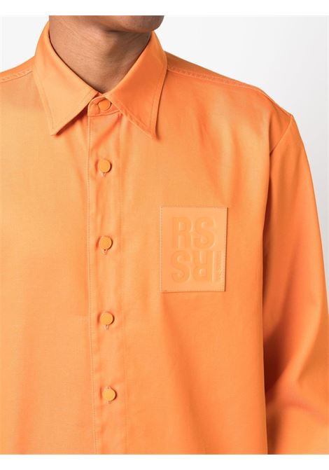Orange logo-patch long-sleeve shirt - men RAF SIMONS | 231M242150010035