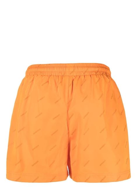 Orange all-over logo print swim shorts - men REPRESENT | M11001237